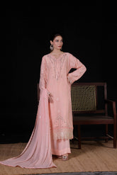 Woman in pink embroidered traditional outfit, SAFFRON, a stunning blend of luxury and sophistication. Crafted from premium chiffon fabric