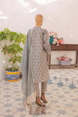 Mannequin wearing a floral dress with a dupatta in a room with plants and a table.
