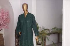 Mannequin wearing a dark green traditional outfit with floral patterns in an indoor setting.
