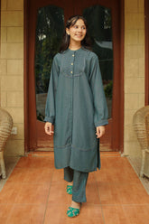 The Cotton Karandi 2-pc suit offers a perfect blend of comfort and style. Lightweight and breathable, it’s ideal for casual outings or special occasions.