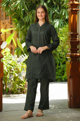 Adorable dobby cotton 2 pc suit for girls with delicate embellishments.