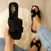 "Designer black slipper inspired by Hermes"