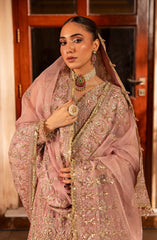 Side pose of model showing Aylin Mauve Mist dress for party wear