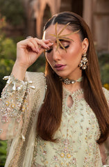 Close-up of model highlighting fabric of Aylin Sage formal dress