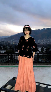 Peach cotton tiered long skirt styled with fusion shirts for women