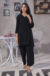 Discover stylish printed cotton suits & classic black cotton suits for women.