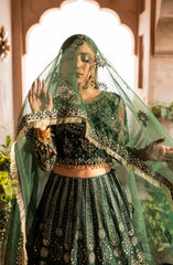 Close-up of model in Aylin emerald maxi highlighting fabric details