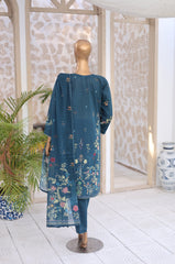 Mannequin wearing a blue floral dress in a room with decorative elements.
