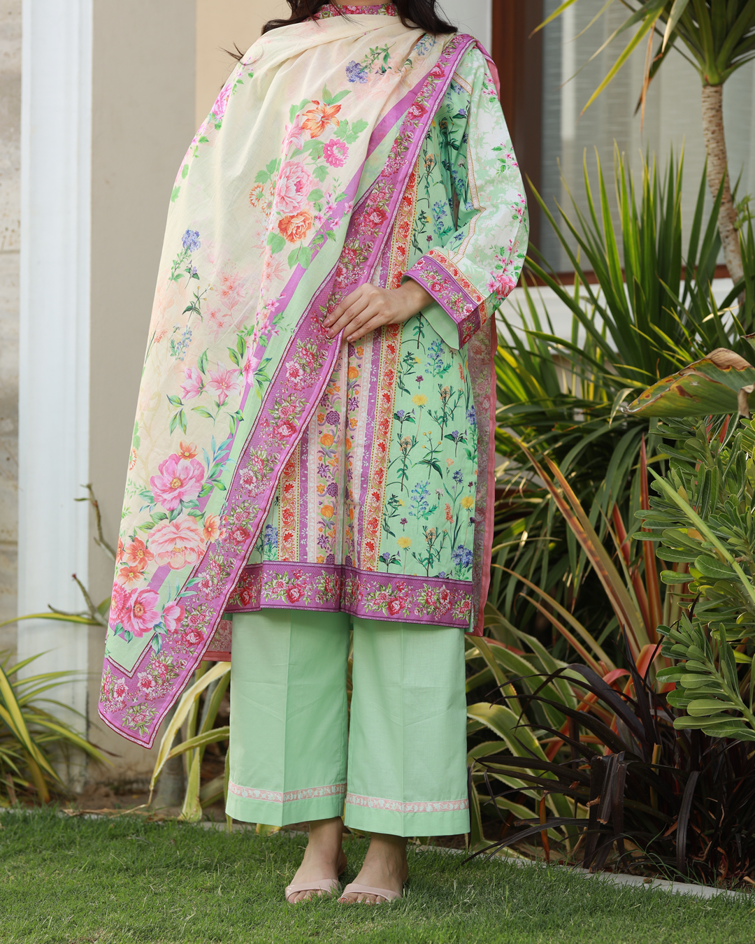 Colors of Confidence Lawn Digital Print Unstitched Suit Set in powder green with vibrant multi-panel floral design, three-piece ethnic outfit for women.