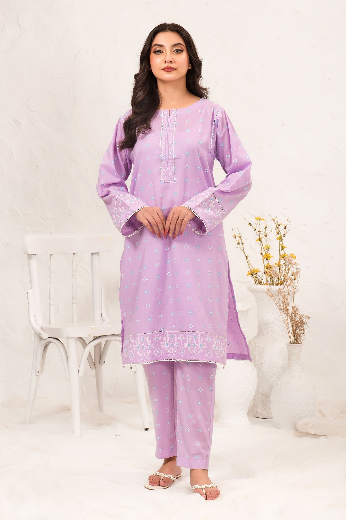 Stylish Cotton Printed 2-piece suit featuring traditional Pakistani dress design, crafted from soft, breathable cotton fabric for a comfortable and elegant look.