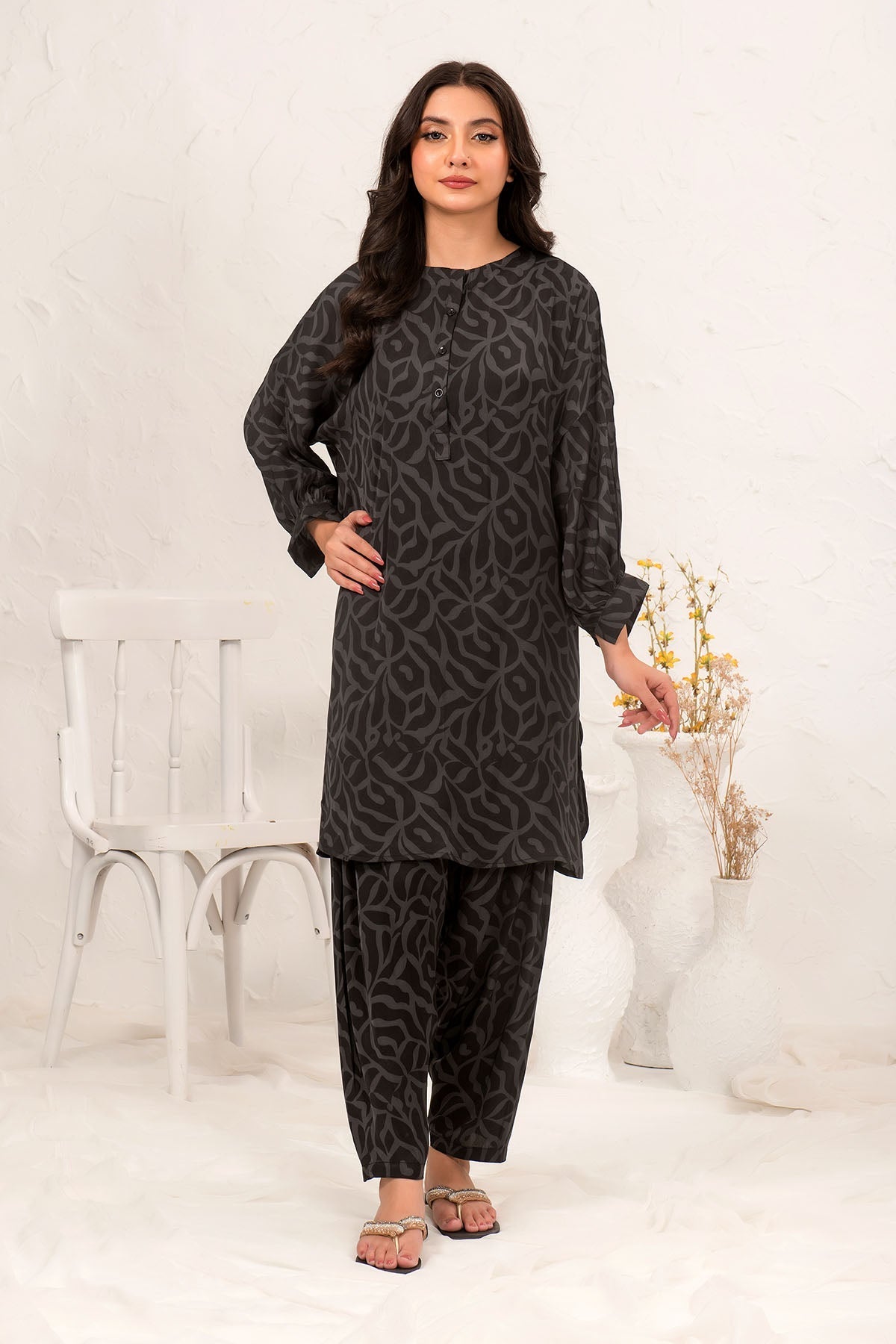 Stylish Cotton Viscose Printed 2-piece suit, featuring vibrant prints and a comfortable fabric blend, perfect for a chic and casual look for women.