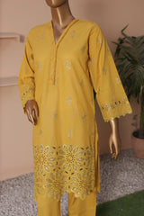 Yellow embroidered kurta on a mannequin against a neutral background