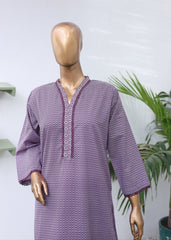 Purple textured dress on a mannequin with a white background