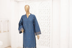 Blue dress with intricate patterns on a mannequin against a white decorative wall.