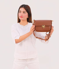 RTW Creation - Brown saddle bag with twist lock