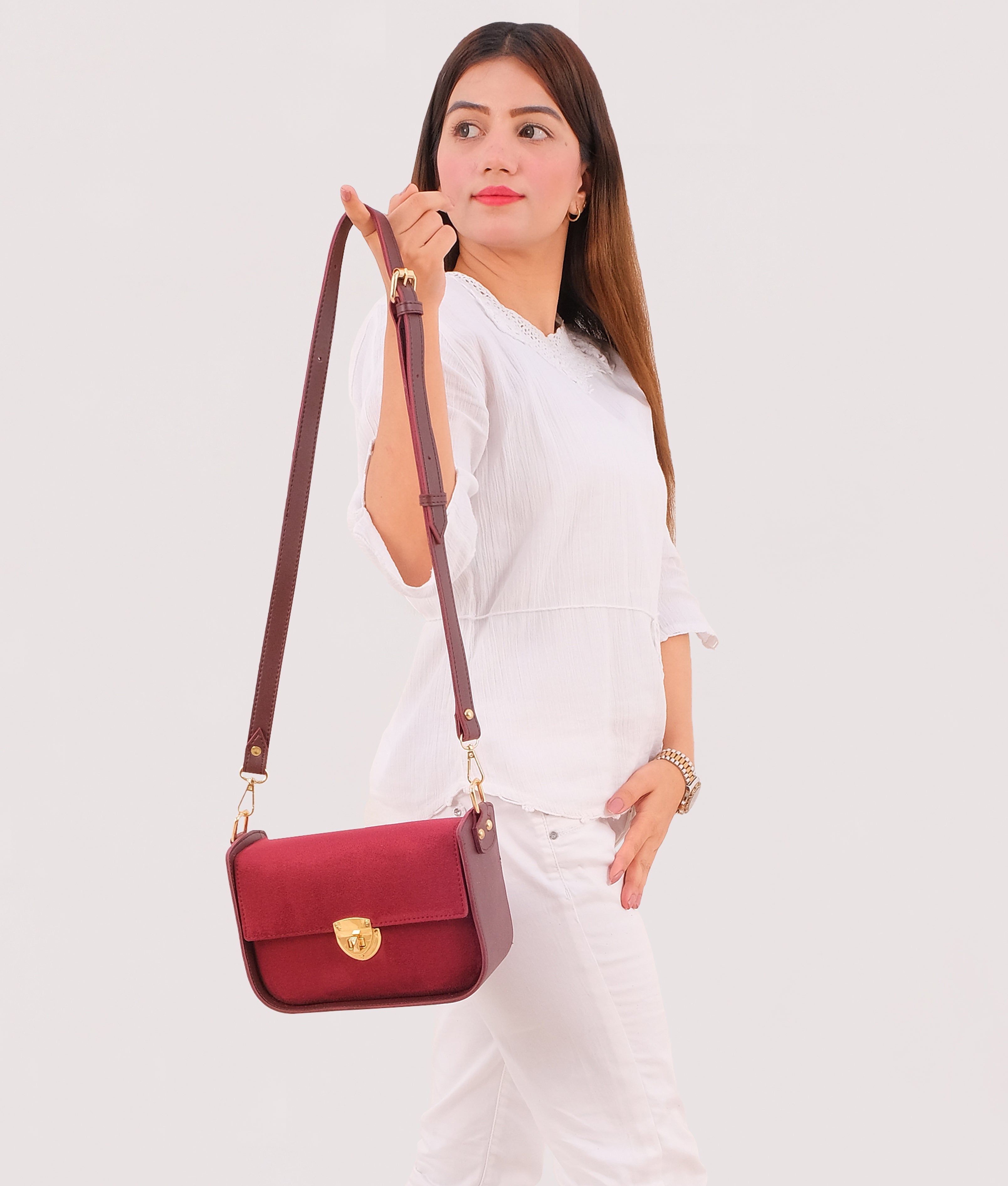 RTW Creation - Burgundy suede saddle bag with twist lock