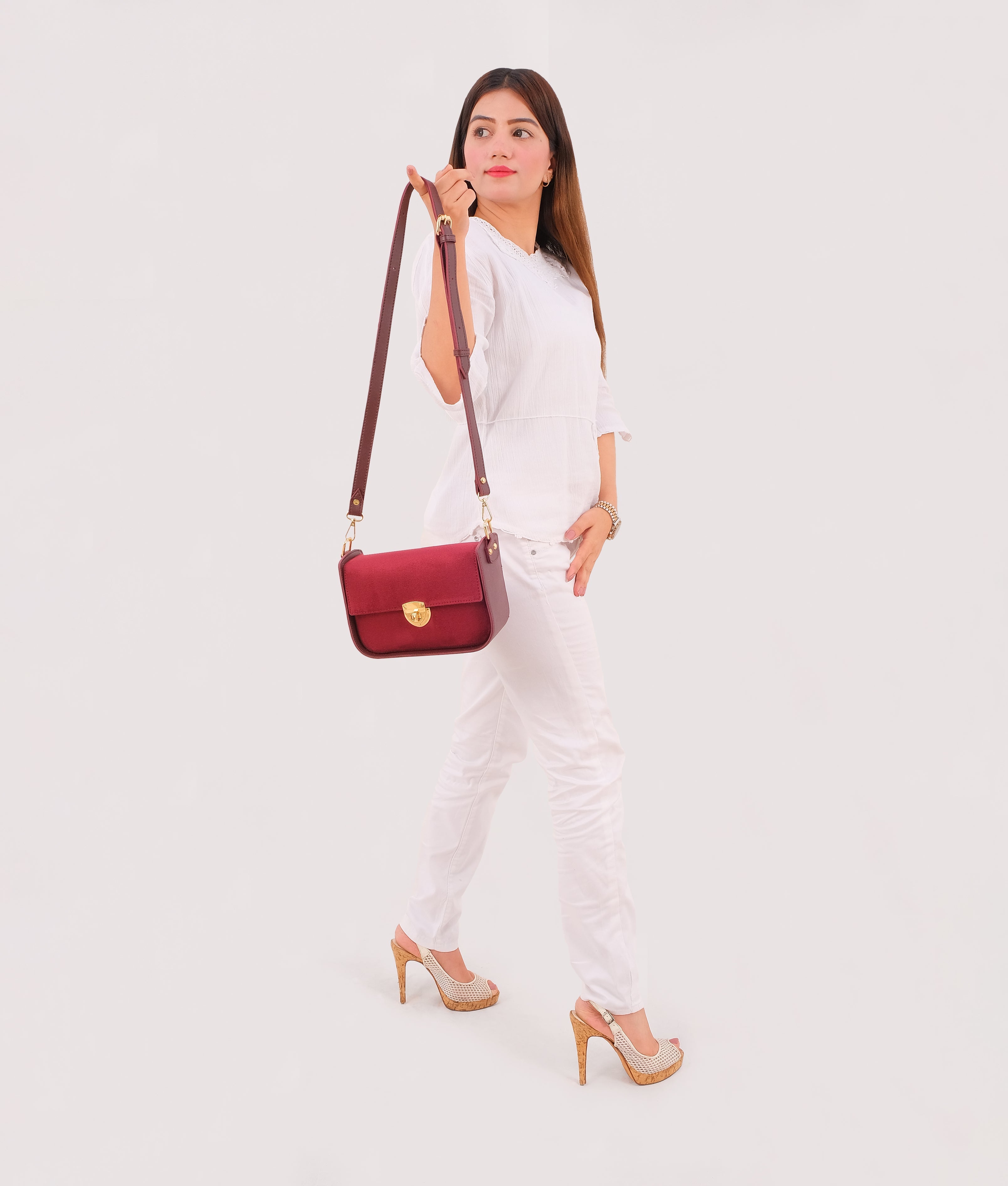 RTW Creation - Burgundy suede saddle bag with twist lock