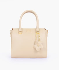RTW Creation - Off-white handbag with flower charm