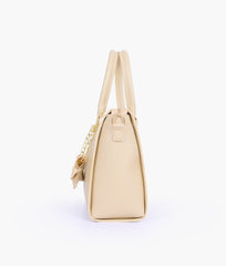 RTW Creation - Off-white handbag with flower charm