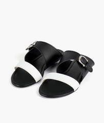 RTW Creation - White and black buckle-up flats